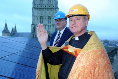 28_the_dean_of_gloucester_blessing_the_solar_installation_with_ben_harrison_of_mypower.jpg